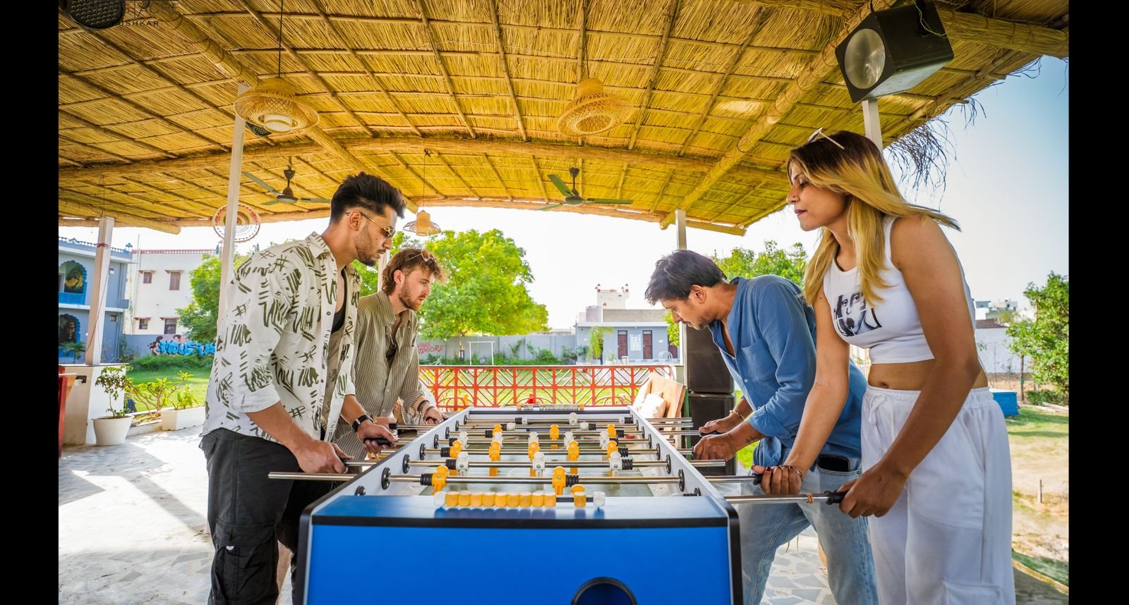 Guests playing foosball at Eartham cafe, Pushkar