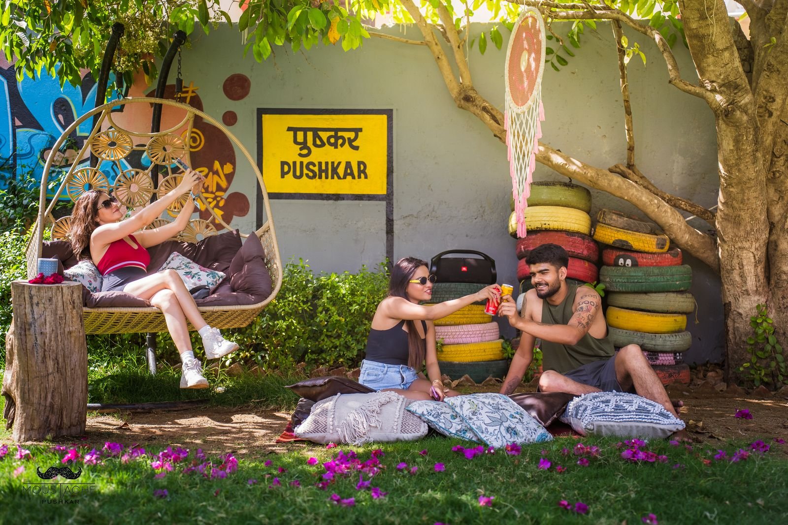 Friends at the Moustache Pushkar garden cafe