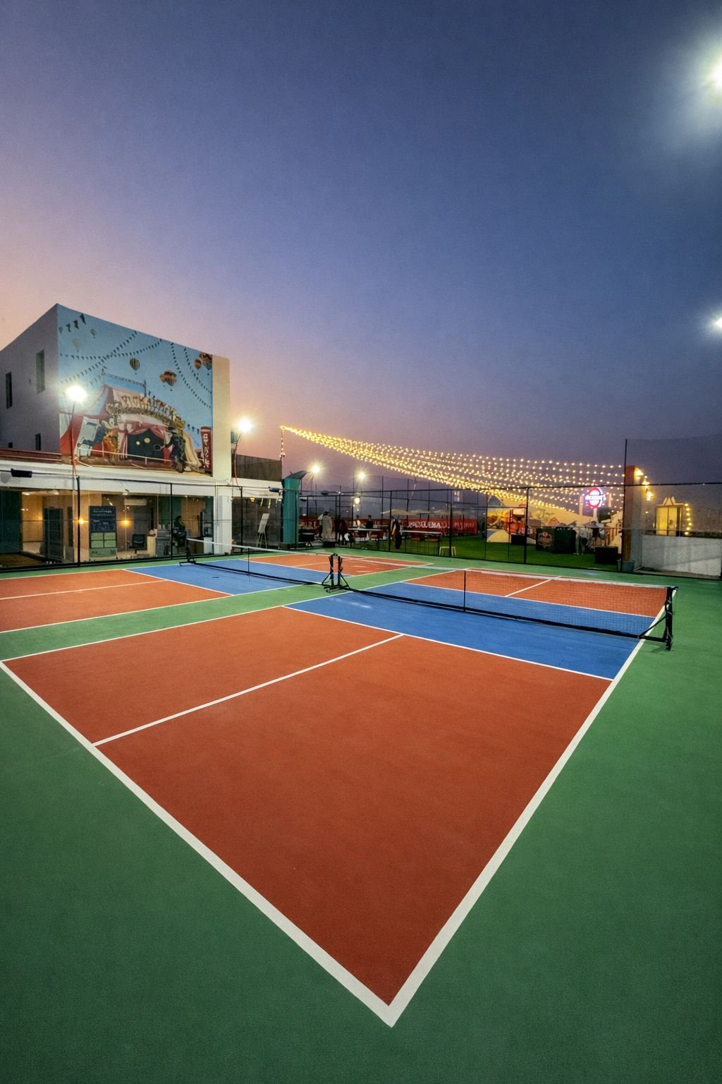Pickadily pickleball court at dusk