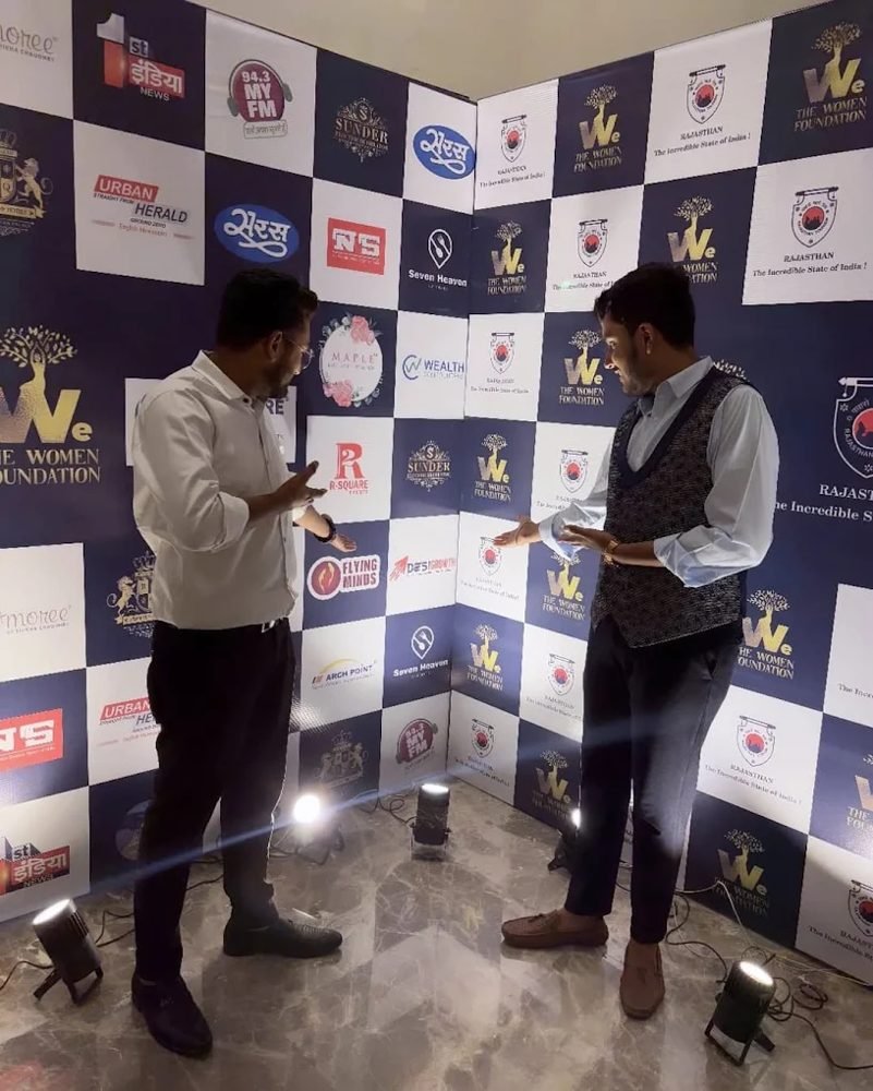 Our team at the We The Women Foundation event branding wall