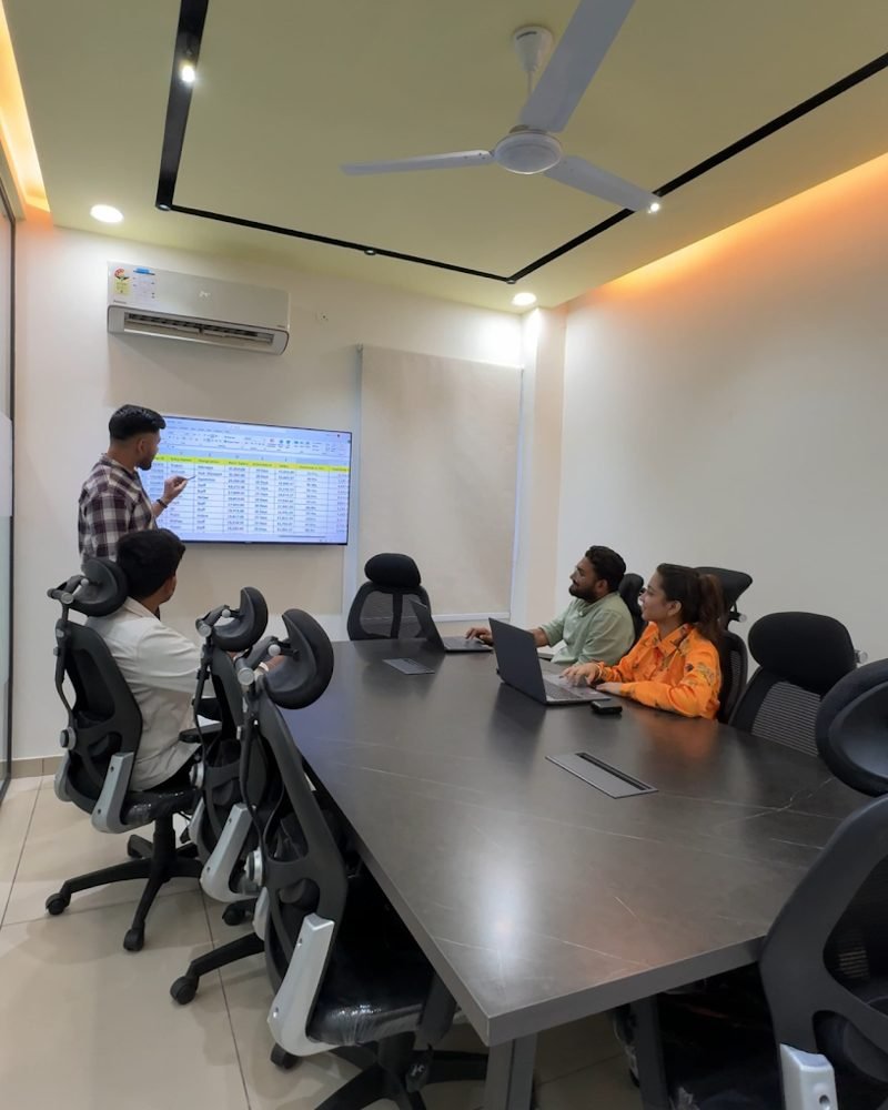 A client meeting in the Desi Growth Media boardroom